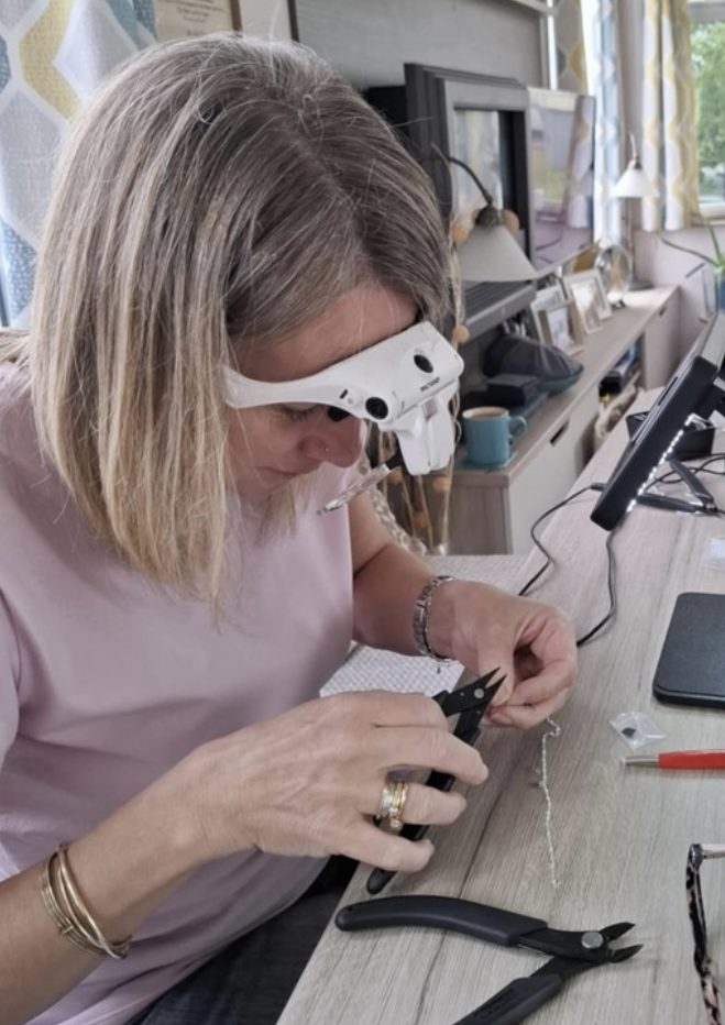 Justine working on a bracelet